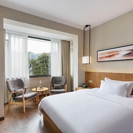 Hangzhou Puyu Travelling With Hotel Esterno foto
