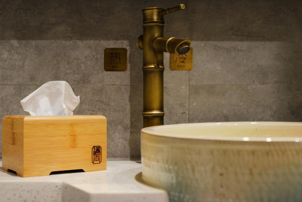 Hangzhou Puyu Travelling With Hotel Esterno foto