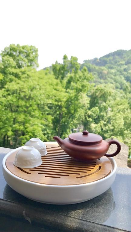 Hangzhou Puyu Travelling With Hotel Esterno foto