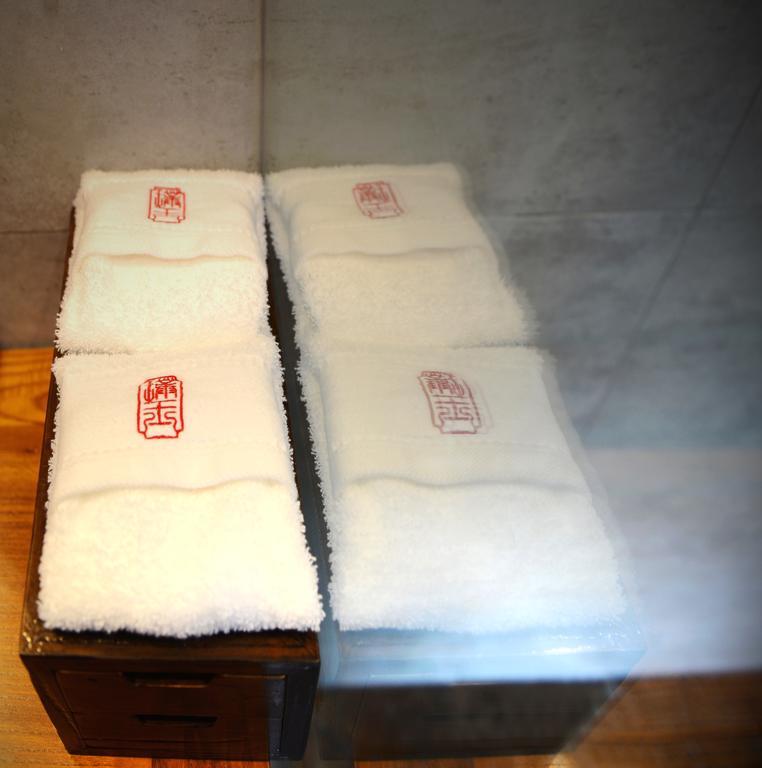 Hangzhou Puyu Travelling With Hotel Esterno foto
