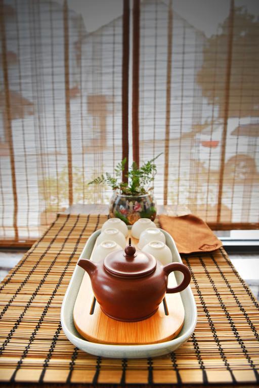 Hangzhou Puyu Travelling With Hotel Esterno foto