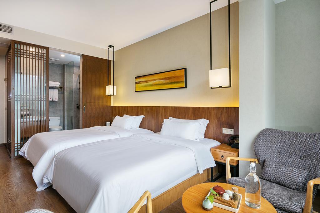 Hangzhou Puyu Travelling With Hotel Esterno foto