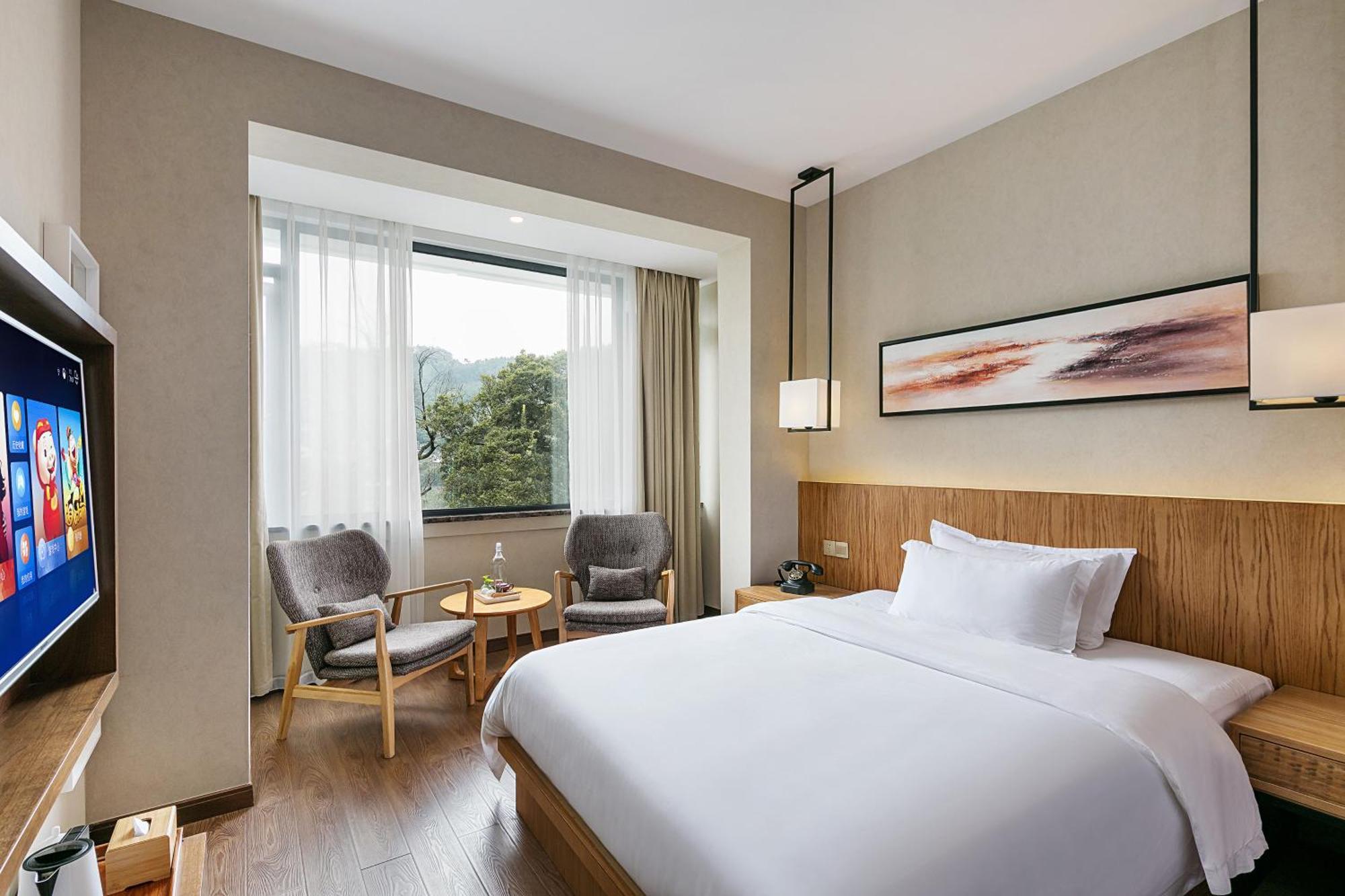 Hangzhou Puyu Travelling With Hotel Esterno foto