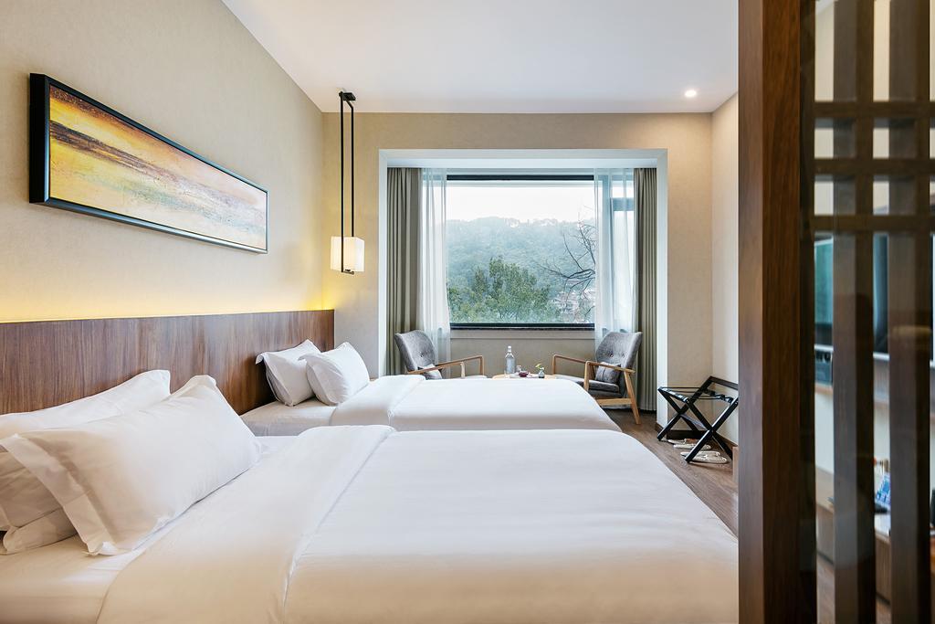 Hangzhou Puyu Travelling With Hotel Esterno foto
