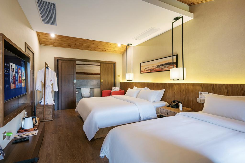 Hangzhou Puyu Travelling With Hotel Esterno foto