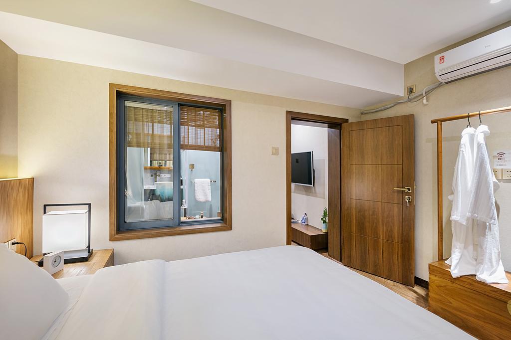 Hangzhou Puyu Travelling With Hotel Esterno foto